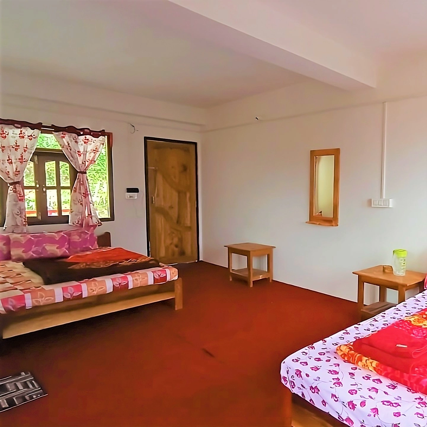 Family homestay in Kolakham with cozy rooms, mountain views, and a peaceful environment for all ages
