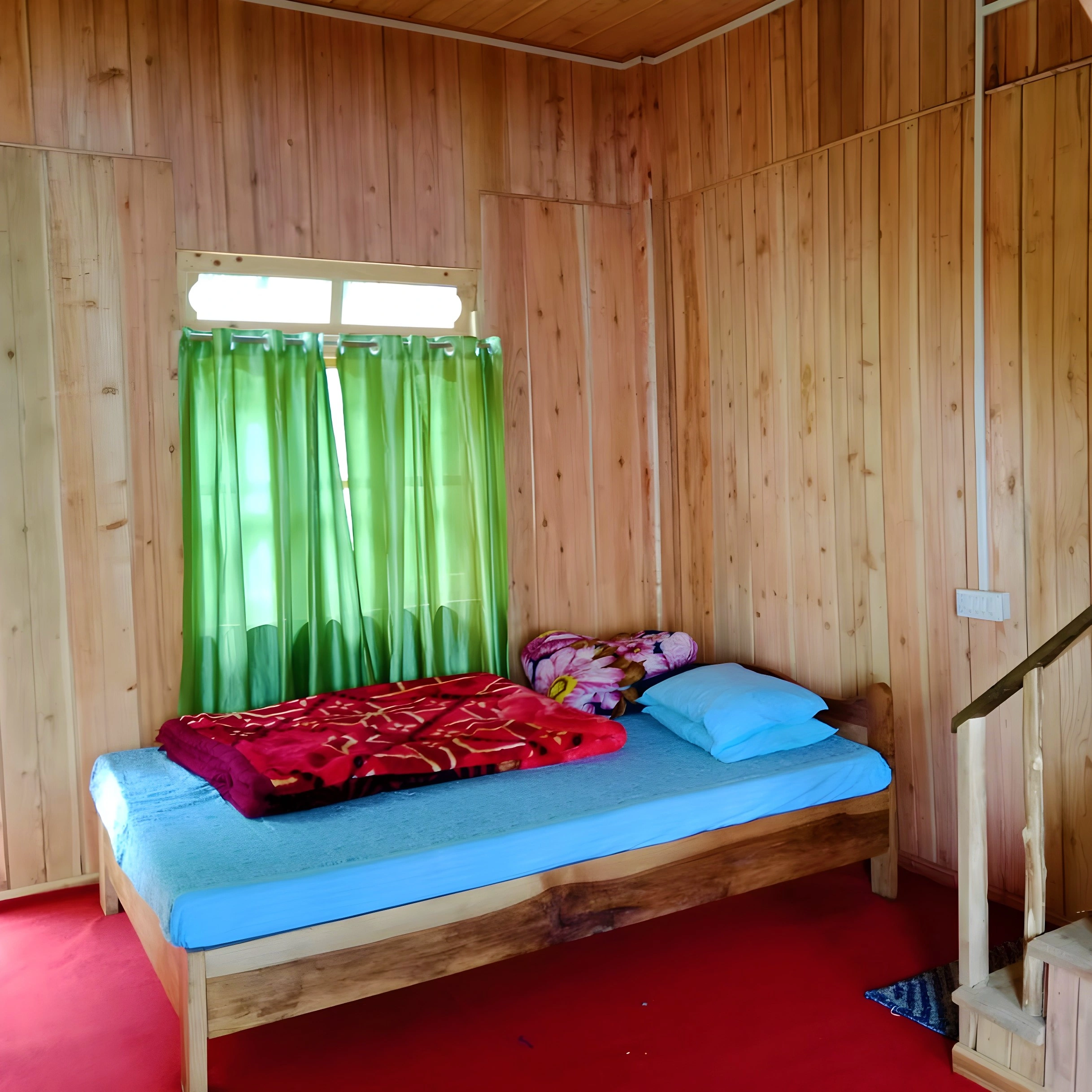 Family homestay in Kolakham with cozy rooms, mountain views, and a peaceful environment for all ages